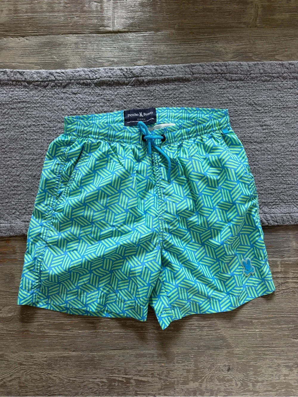 Psycho Bunny Boys’ Swim Trunks & Graphic Tee, and Columbia Rash Guard